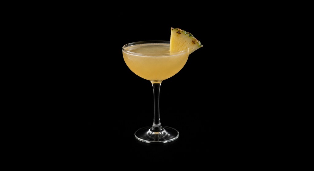 Che's Revolution cocktail on a dark studio background