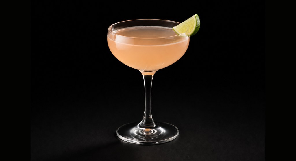 Chocolate Presidente cocktail on a dark studio background