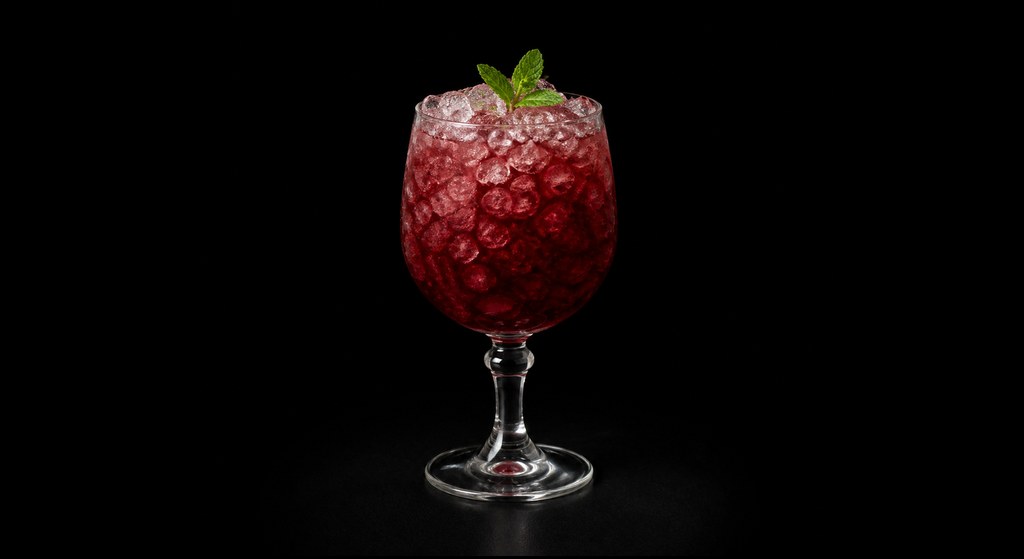 Claret Cobbler cocktail on a dark studio background