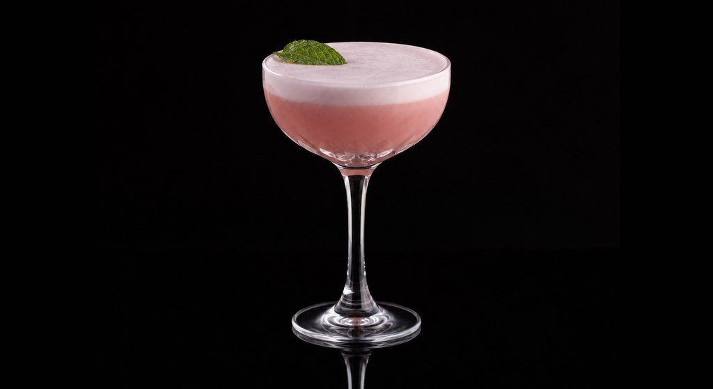 Clover Leaf cocktail on a dark studio background