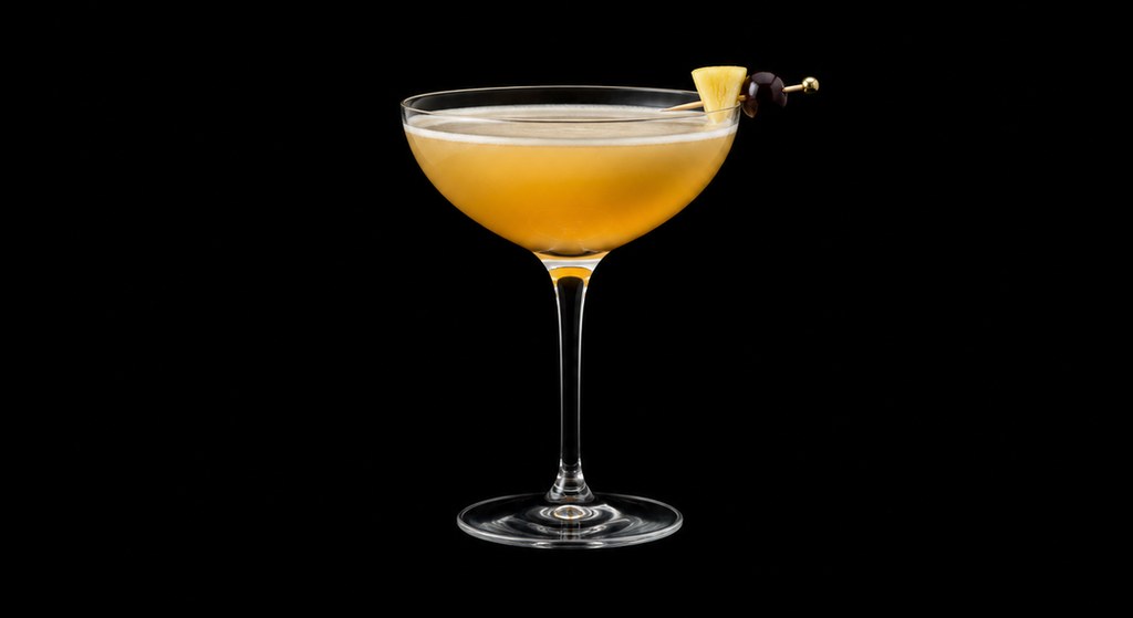 Club Cocktail cocktail on a dark studio background