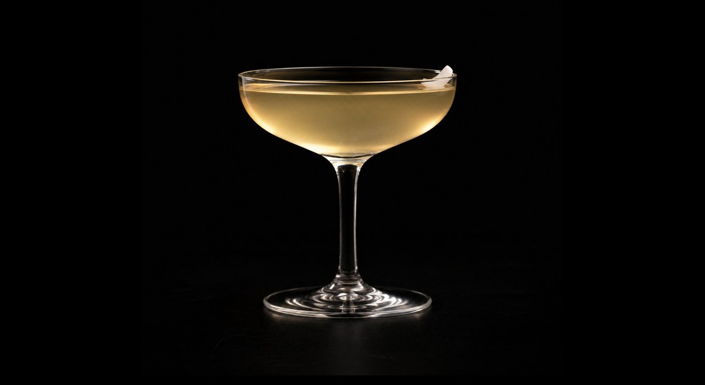 Coco Geisha cocktail on a dark studio background
