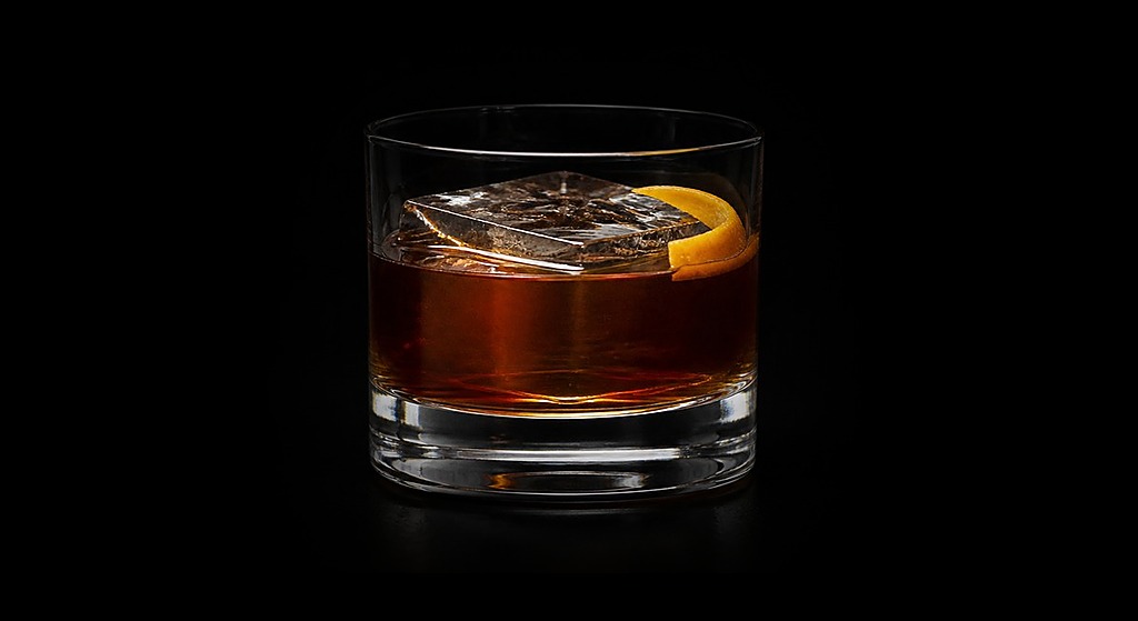 Cocoa Tea cocktail on a dark studio background