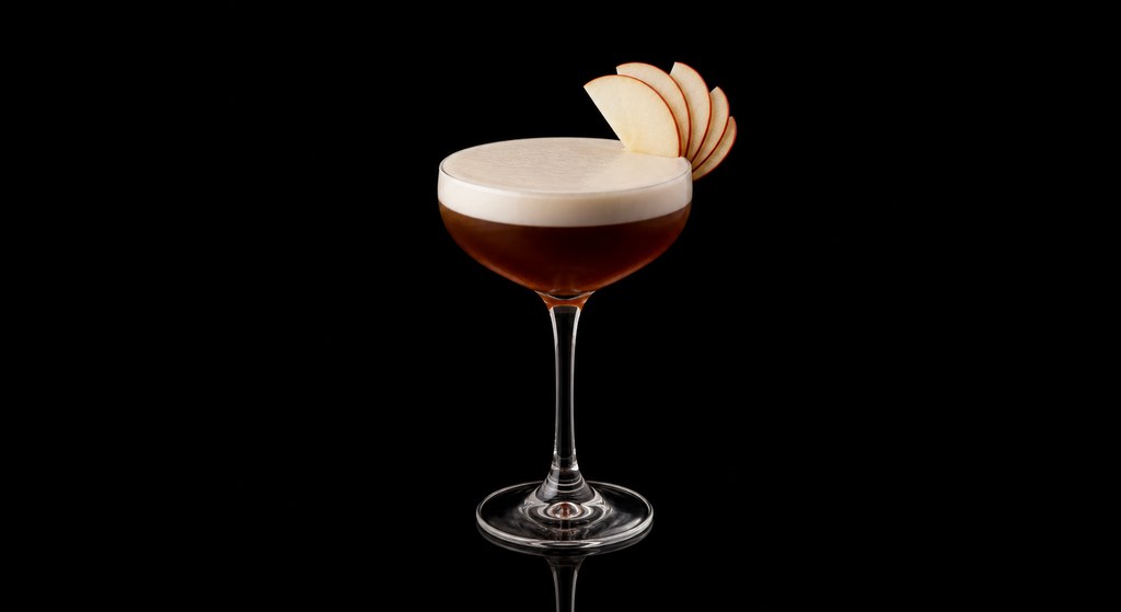 Color in Your Cheeks cocktail on a dark studio background