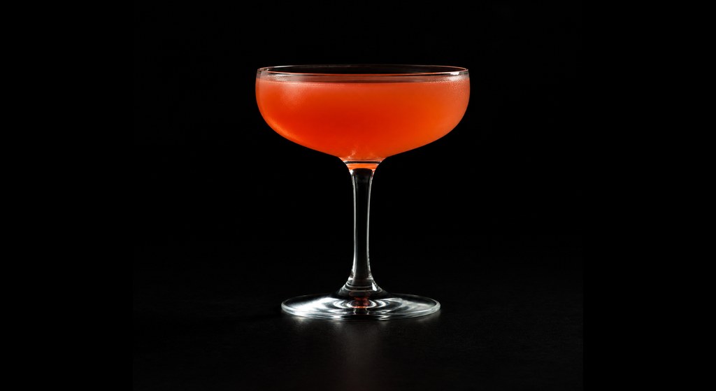 Cosmic Dance Break cocktail on a dark studio background