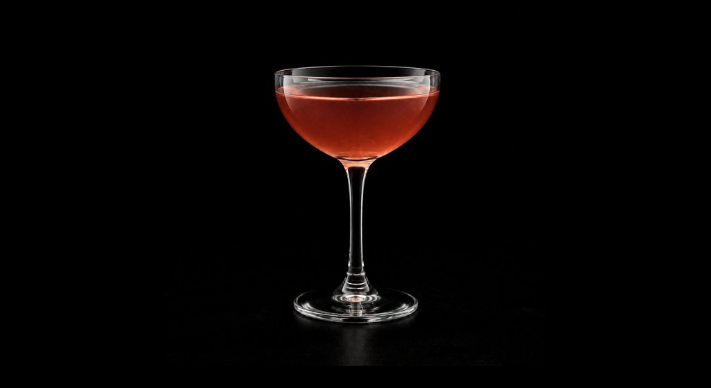 Cosmopolitan Delight cocktail on a dark studio background