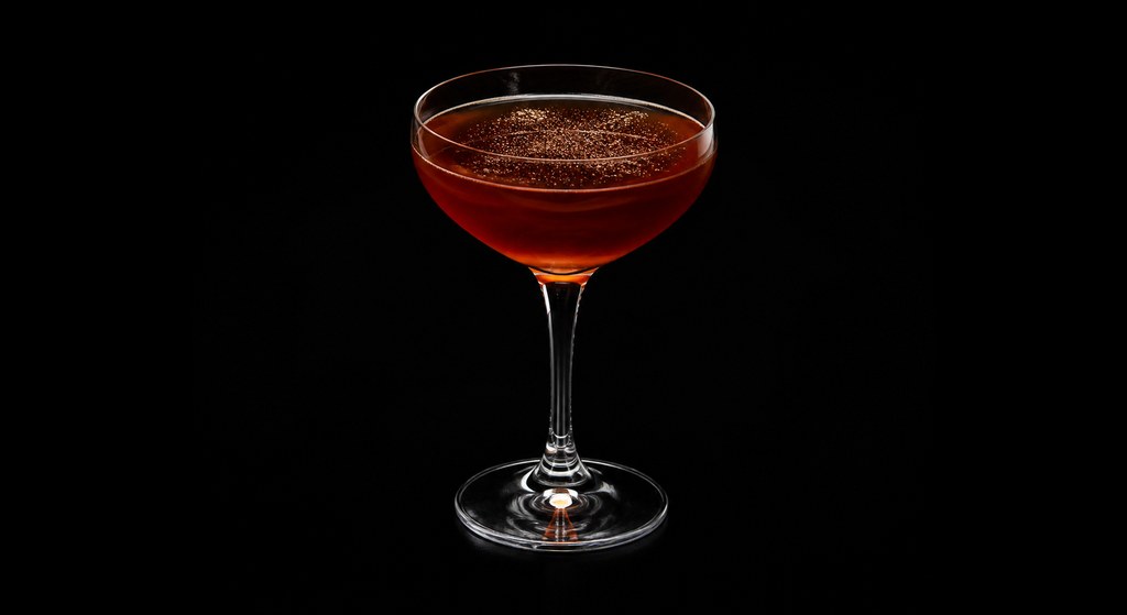 Cradle to The Grave cocktail on a dark studio background