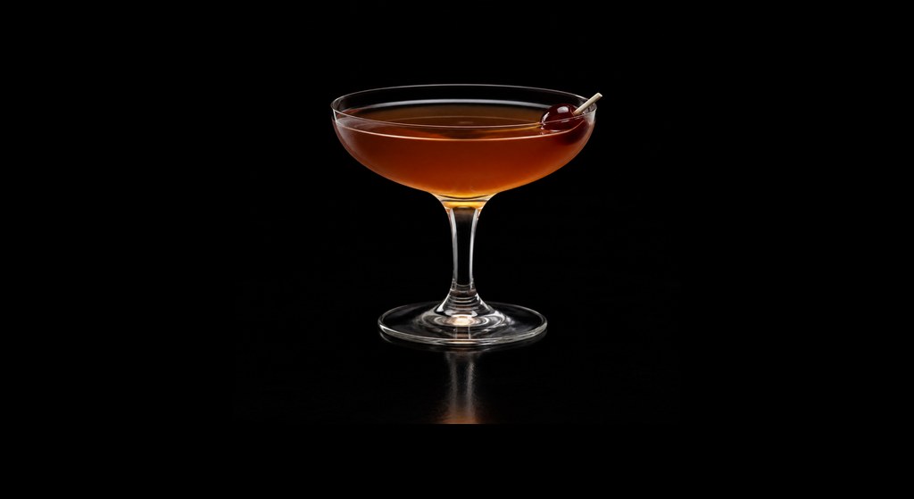 Creole Contentment cocktail on a dark studio background