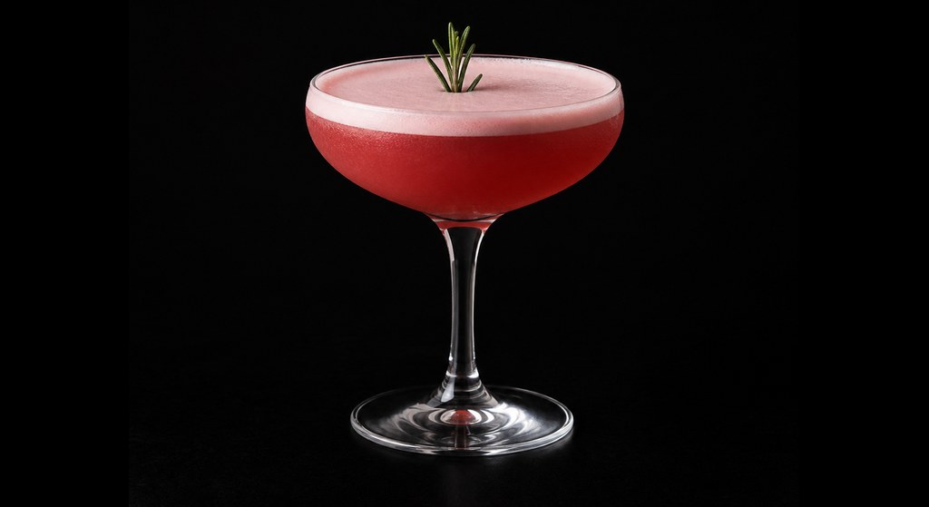 Crimson Art cocktail on a dark studio background