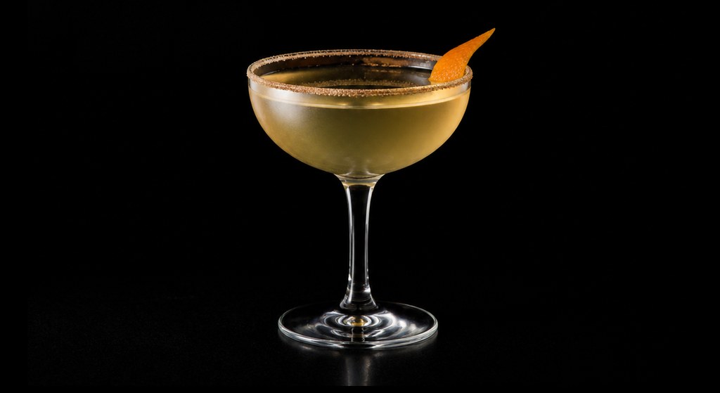 Crusta Alcala cocktail on a dark studio background