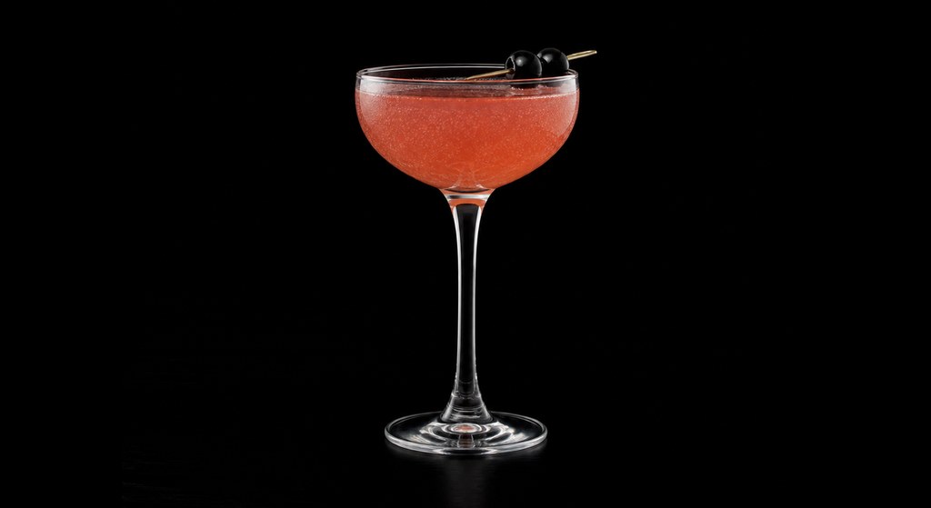 Curtain Call cocktail on a dark studio background