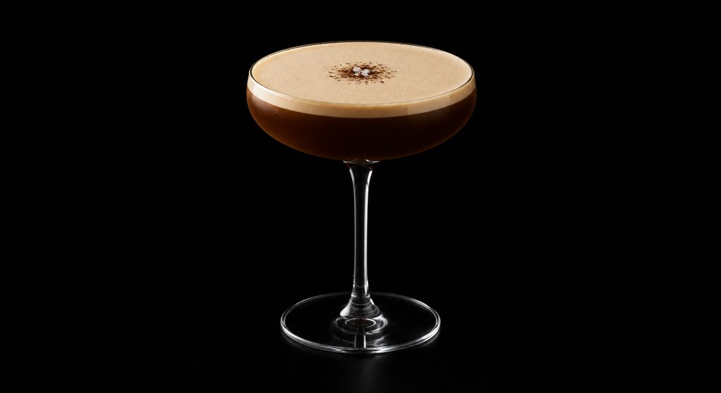 Daily Rituals cocktail on a dark studio background
