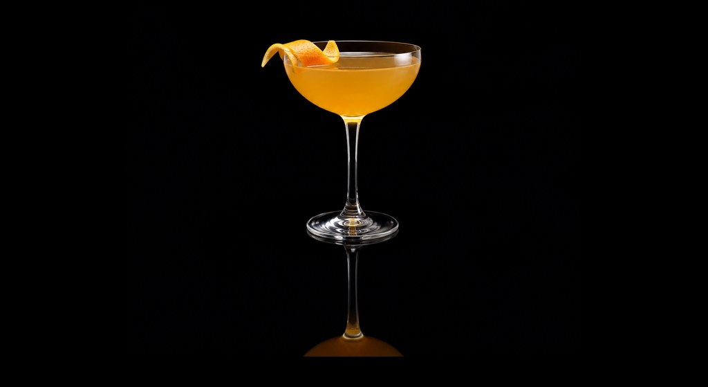 Damn-the Weather cocktail on a dark studio background