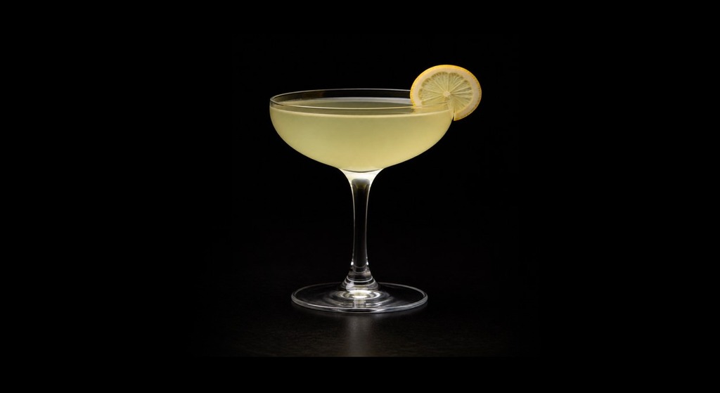 Dandylion cocktail on a dark studio background