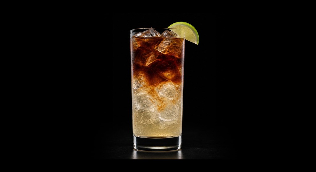 dark and stormy cocktail in a serving glass
