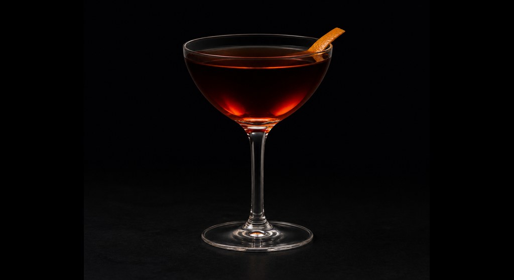 Darkness Calls cocktail on a dark studio background