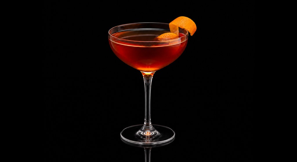 Delmonico cocktail on a dark studio background