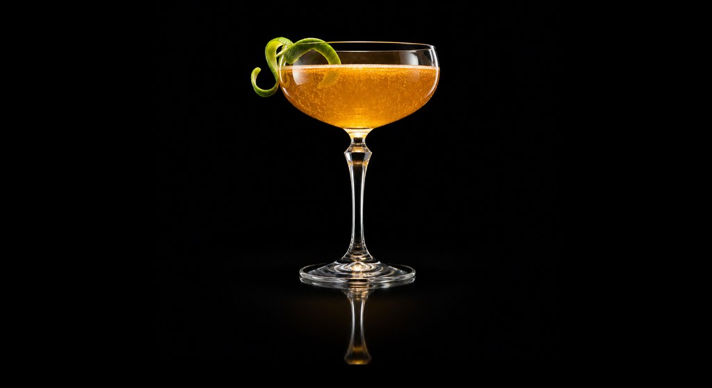 Delores Royale cocktail on a dark studio background