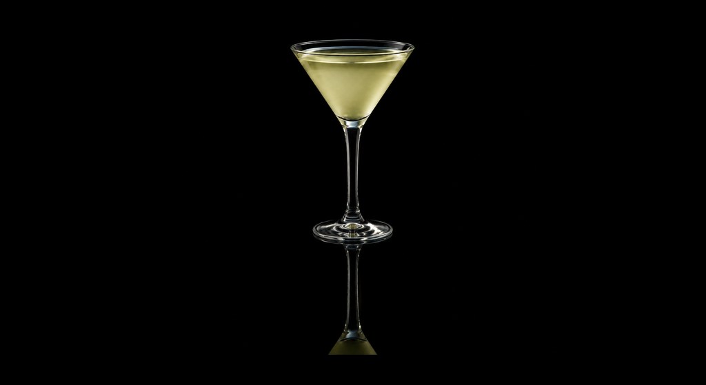 Dernier Mot cocktail on a dark studio background