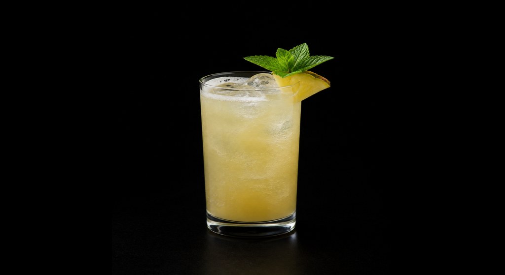 Doheny Pisco Punch cocktail on a dark studio background
