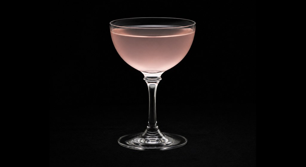 Domino cocktail on a dark studio background