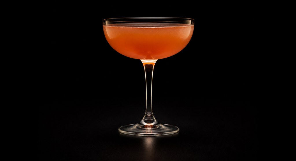 Dry Tongue Therapy cocktail on a dark studio background
