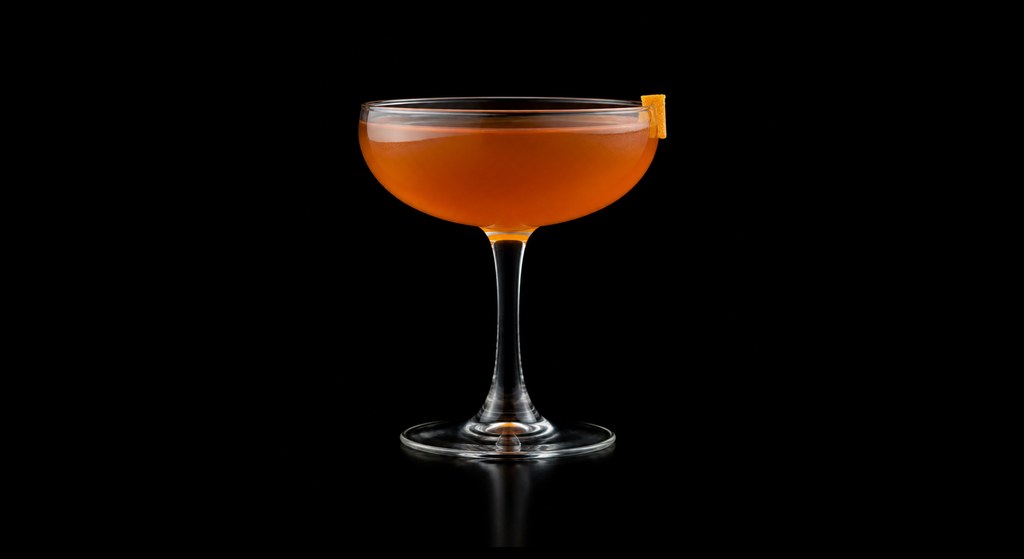 Dutch Blood and Sand cocktail on a dark studio background