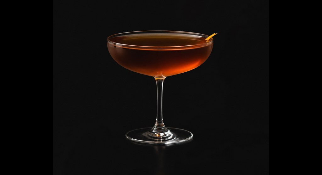 Dutch Coupe cocktail on a dark studio background