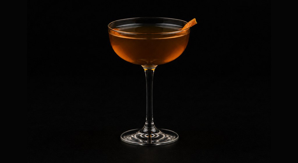 East Meets West cocktail on a dark studio background