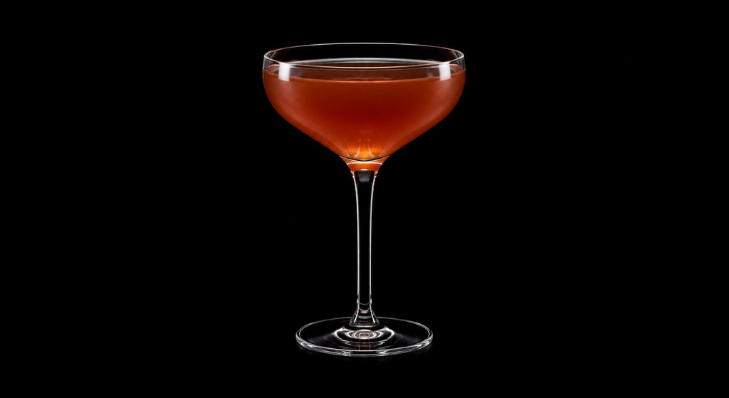 Easter Elchies cocktail on a dark studio background