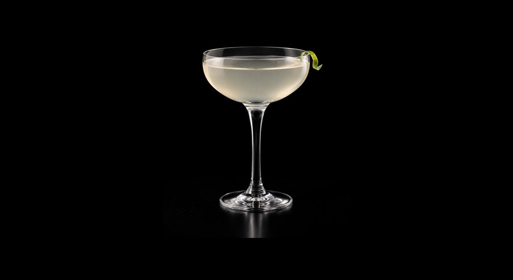 El Coco cocktail on a dark studio background