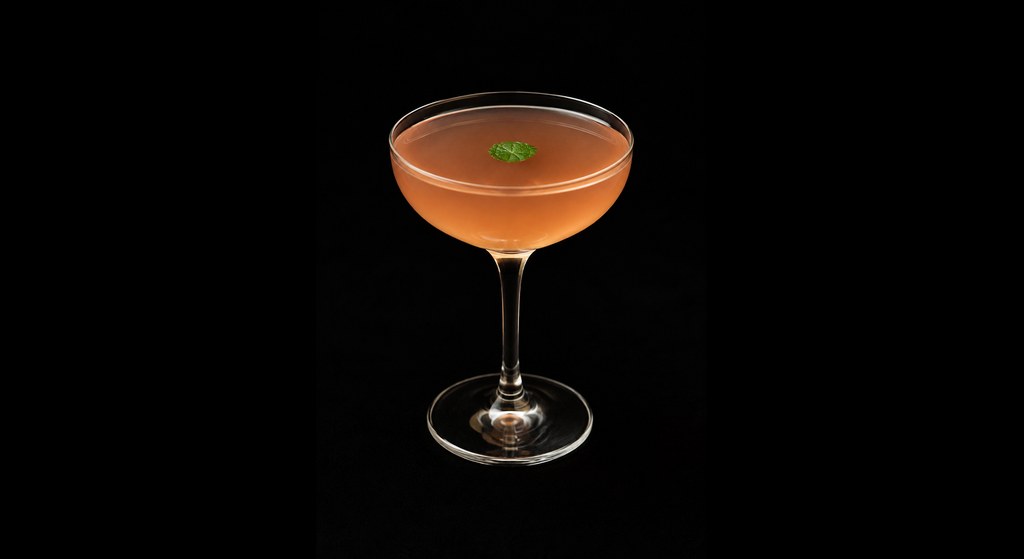 El Presidente (with Rhum Agricole) cocktail on a dark studio background