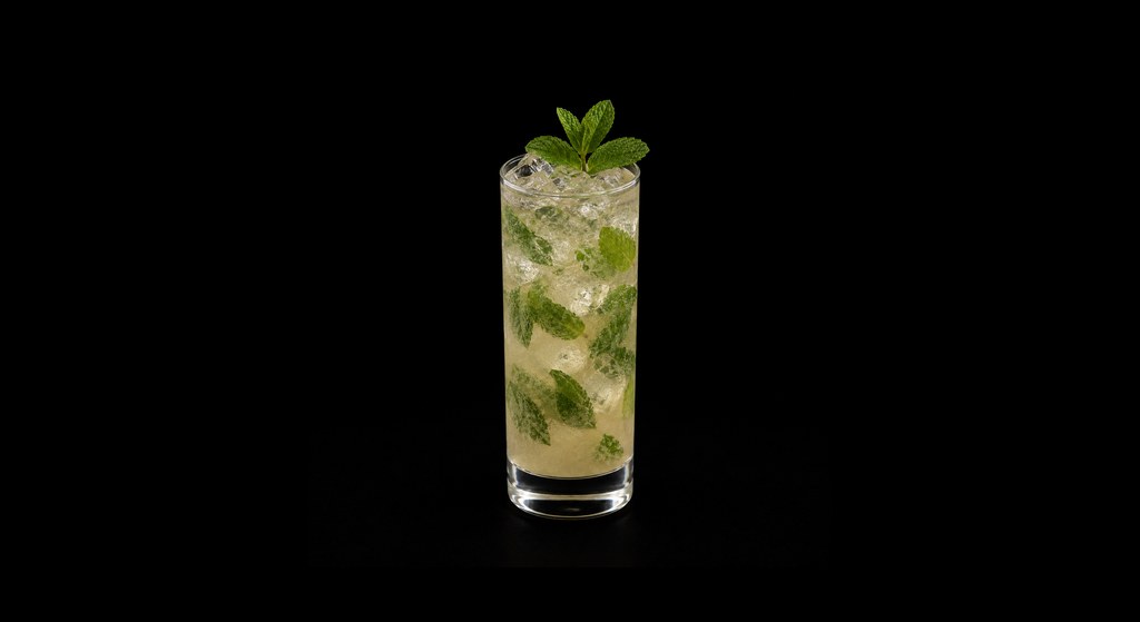 Elderflower Mojito cocktail on a dark studio background