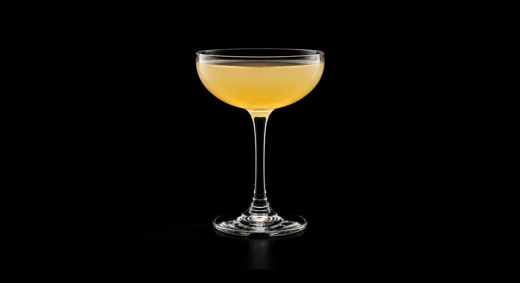 English Garden cocktail on a dark studio background