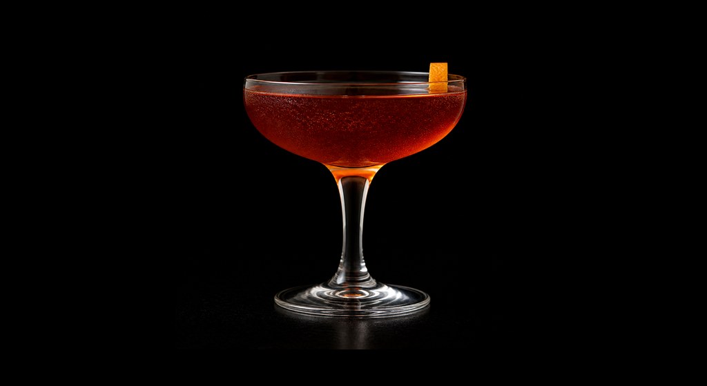 Enrico Pallazzo cocktail on a dark studio background