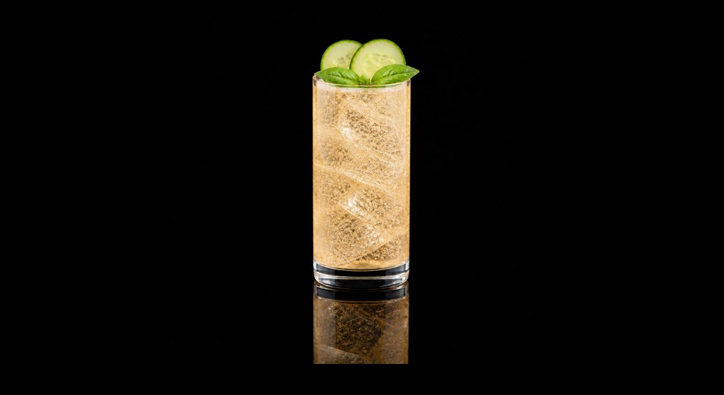 Eponine Collins cocktail on a dark studio background