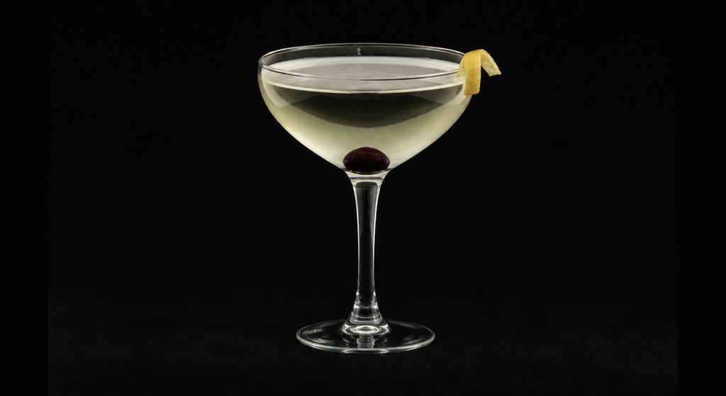 Eric Alperin's Tuxedo No. 2 cocktail on a dark studio background