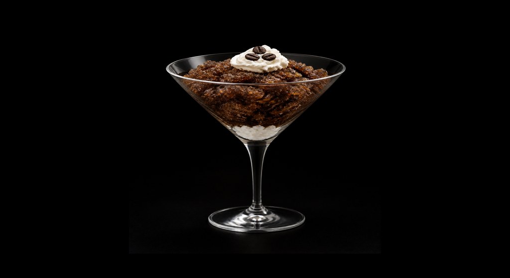 Espresso Martini Granita cocktail on a dark studio background