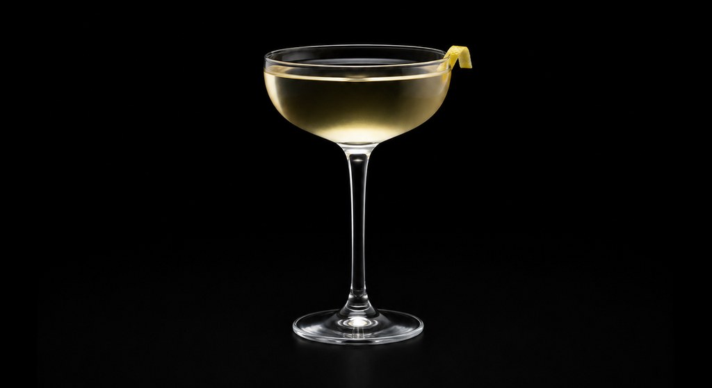 Eve's Temptation cocktail on a dark studio background