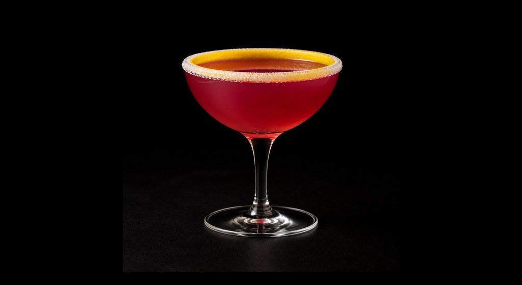 Excuse My French cocktail on a dark studio background