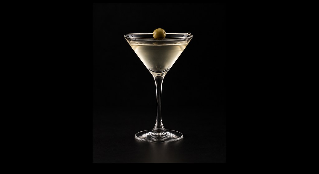 Extra Time Martini cocktail on a dark studio background