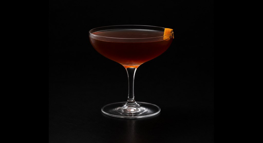 Fake I.D. cocktail on a dark studio background