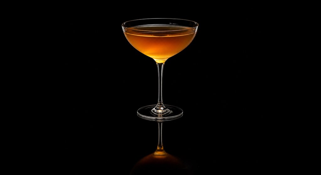 Fin de Siecle cocktail on a dark studio background