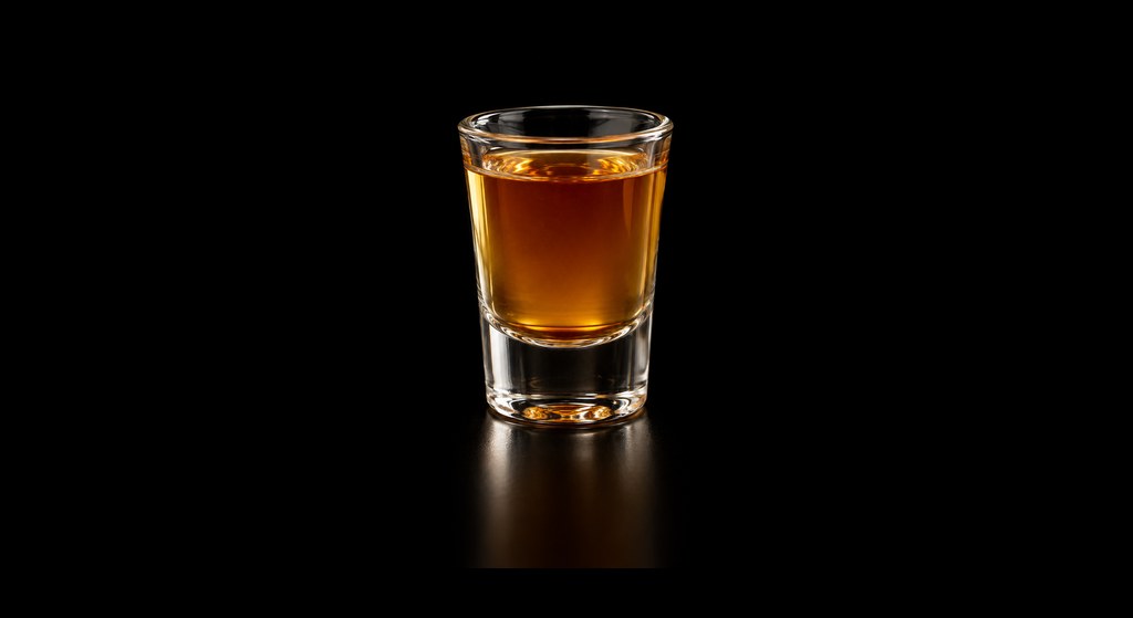 Fireball cocktail on a dark studio background