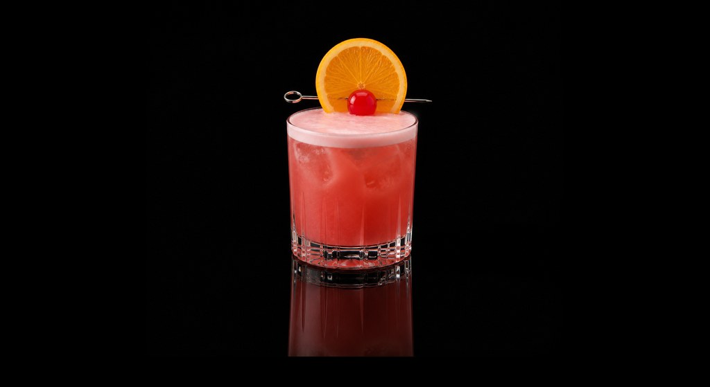 Fireman's Sour cocktail on a dark studio background
