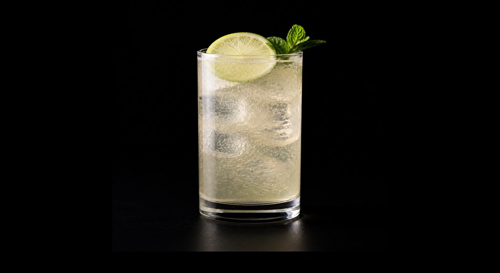 First Class Pass cocktail on a dark studio background