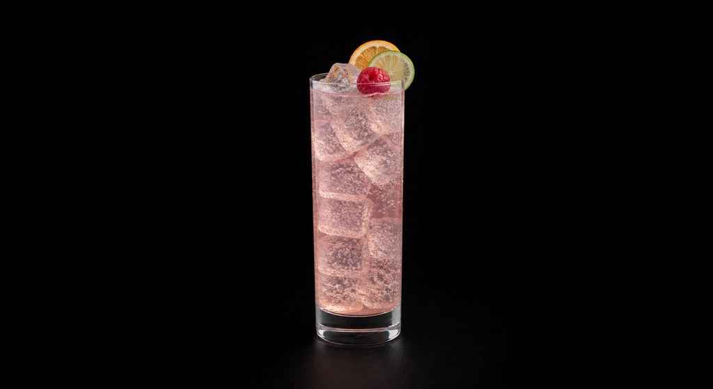Florodora cocktail on a dark studio background