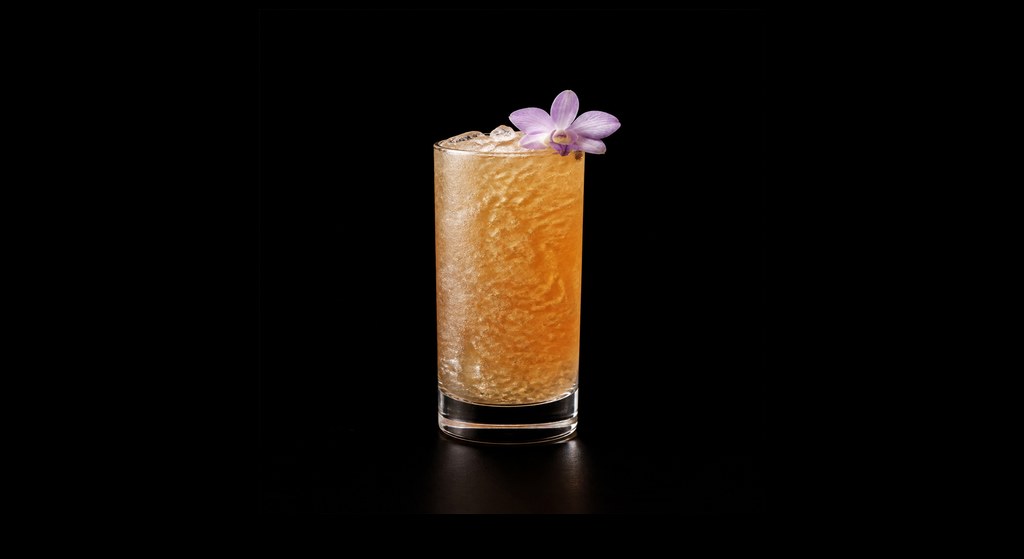 Flying Guillotine cocktail on a dark studio background