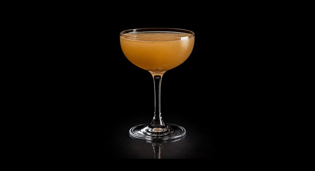 Fog Cutter cocktail on a dark studio background
