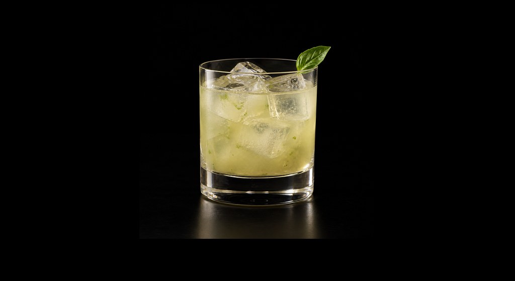 Four Aces cocktail on a dark studio background
